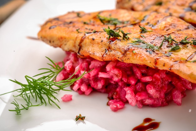 Chicken steak with rice and beetroot juice