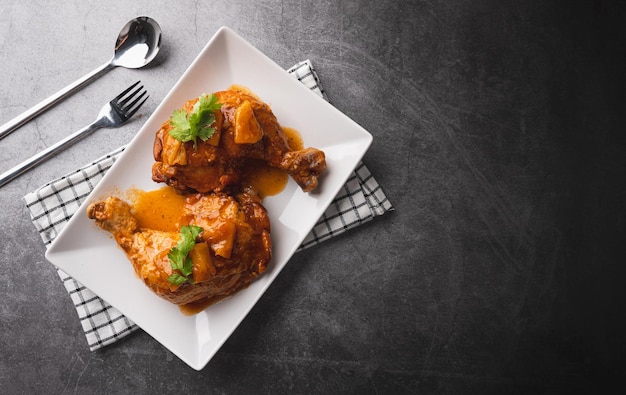 Chicken wings roasted on white plate  top view