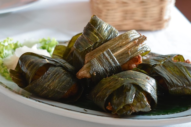 Chicken wrapped with pandan leaf