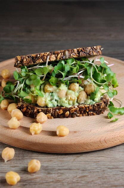 Chickpea Avocado Sandwich with radish sprouts