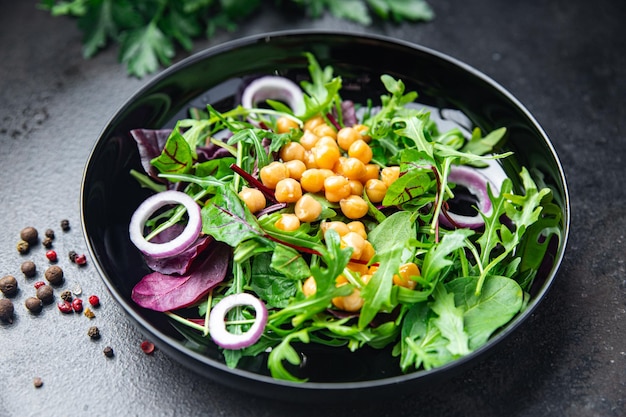 chickpea salad green leaf lettuce mix fresh healthy meal food diet snack on the table copy space