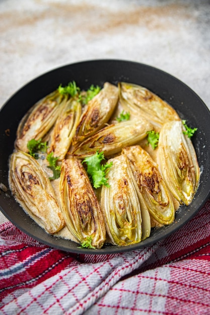 chicory stewed vegetable dish healthy meal food snack on the table copy space food background