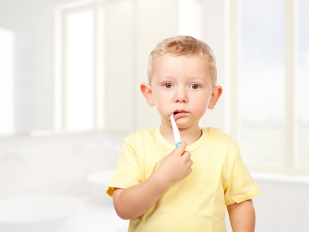 Child brushing teeth