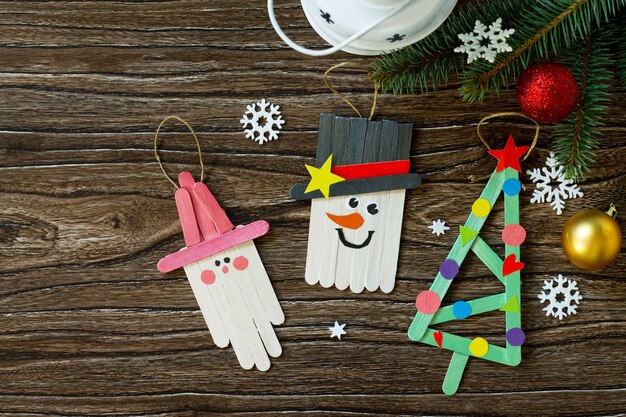 Photo the child draws details christmas decoration or christmas gift  snowman handmade