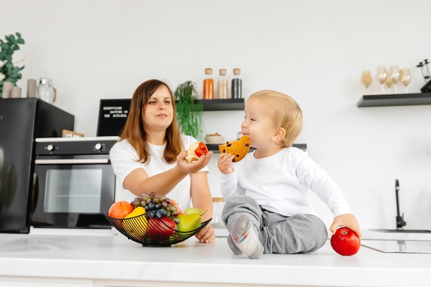 A child eats cookies and refuses to eat right and eat healthy reducetarian eating enjoying plant foo