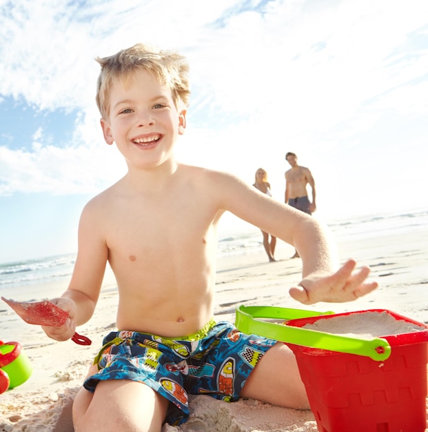 Photo child family and happy portrait at beach for vacation adventure and travel for holiday in summer mother father and boy with smile sand and sunshine in bali with parents and together in nature