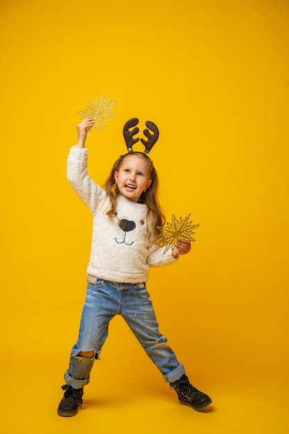 child girl with Christmas stars