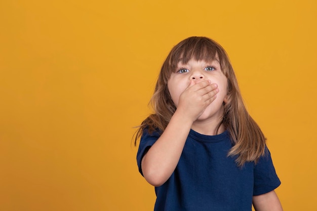 Child girl yawning with mouth open