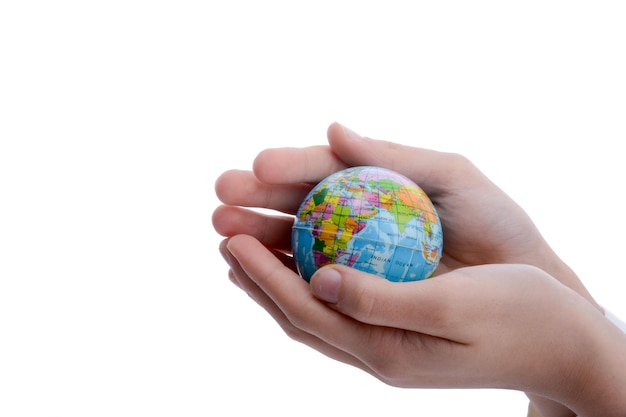 Child holding a globe