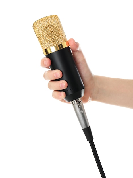 Child holding microphone on white background closeup of hand