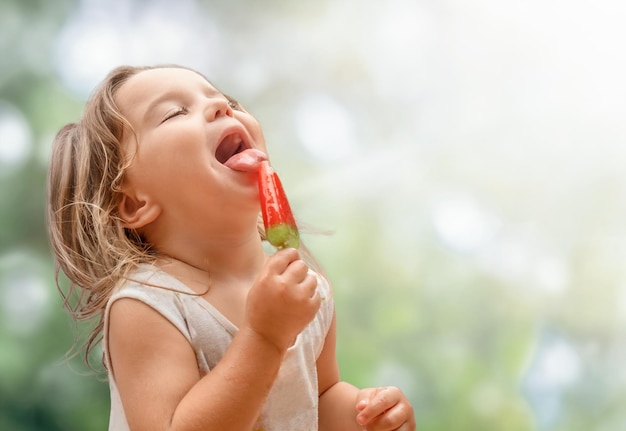 Child licks ice cream