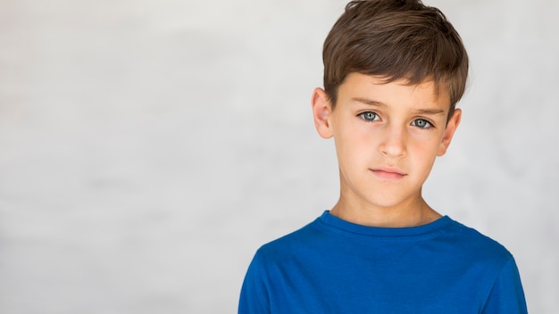 Child looking serious with copy space