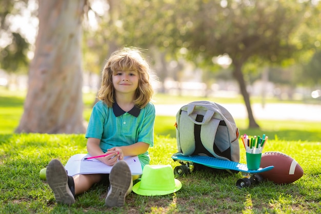 Child painter draw on playground kid boy create artist paints summer vacation school child drawing i