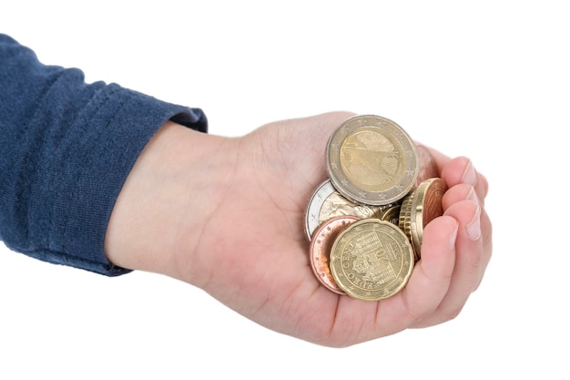 child palm full of euro coins isolated on white background