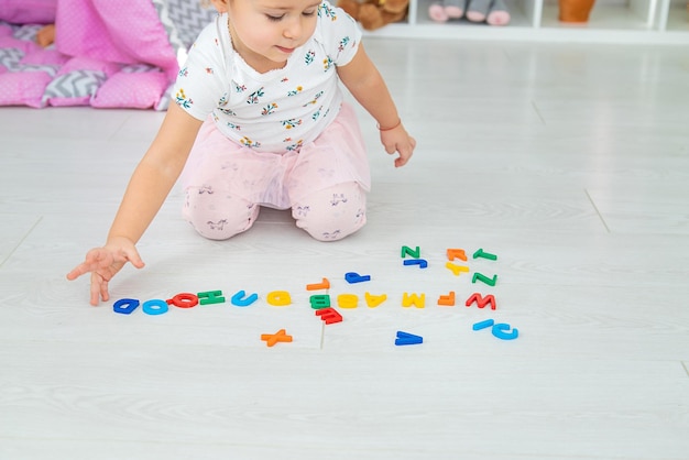 The child plays learns numbers and letters Selective focus