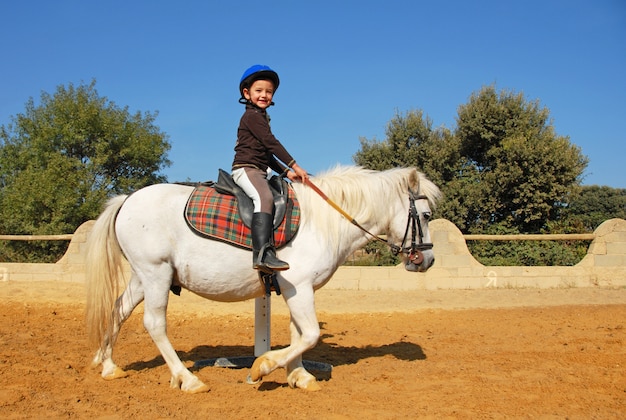 Child and pony