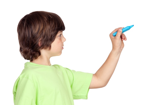 Photo child with blue pen writing on a white background