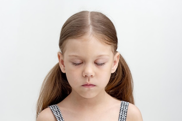 Child with closed eyes