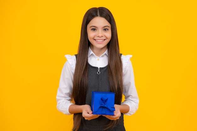 Child with gift present box on isolated background Presents for birthday Valentines day New Year or Christmas