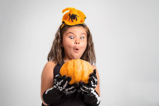 Child with a pumpkin