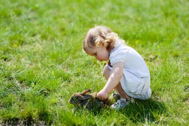 Child with a rabbit