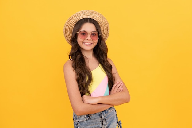 Childhood happiness summer party look happy funny kid in eyeglasses and straw hat