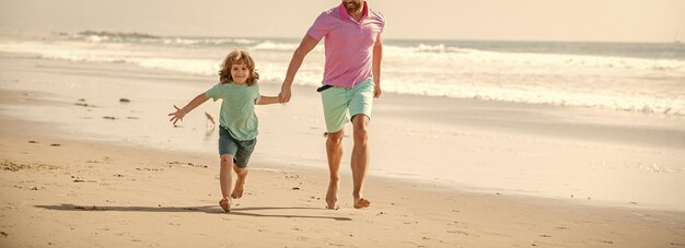 Childhood and parenting cropped father and son running on summer beach family travel