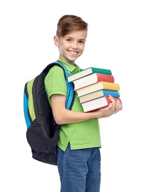 childhood, school, education and people concept - happy smiling student boy with school bag and books