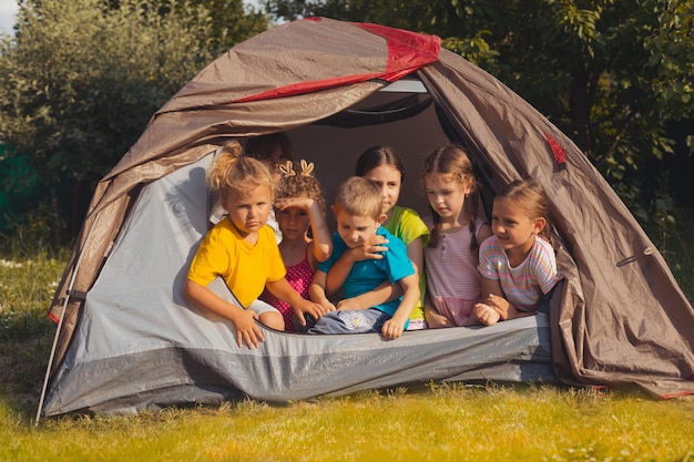 The children are resting in nature in the summer camp