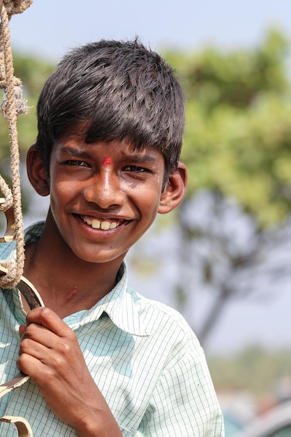 Children of Asia. Portrait of a cheerful boy from India.