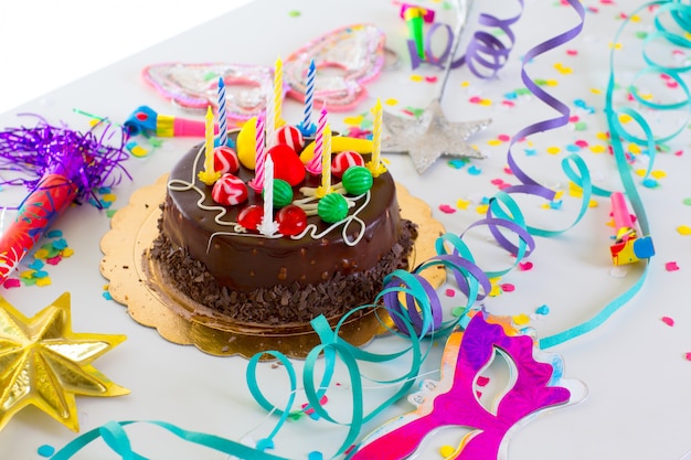 Children birthday party with chocolate cake