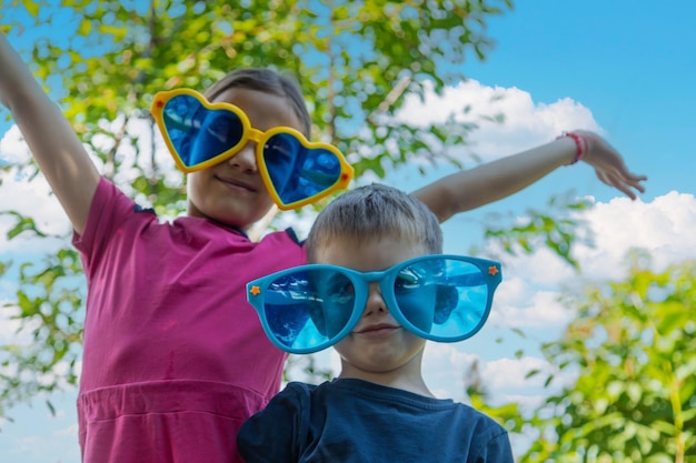 Children enjoy nature in glasses Selective focus