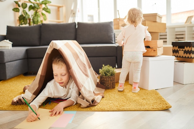 Children getting settled in new apartment