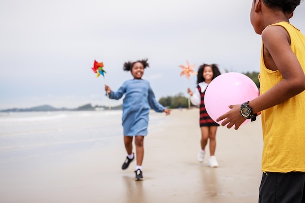 Children having fun on the beach Ethnically diverse concept Happy Group of African American kids