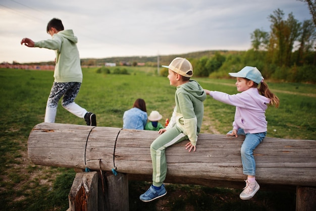 Children having fun together at meadow