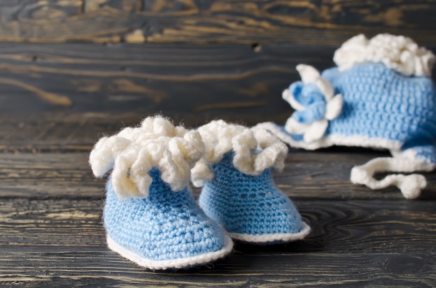 Children knitted garments for the boy. Hat and booties