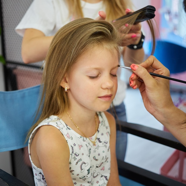 Children make up Glitter makeup Sparkles on cheek