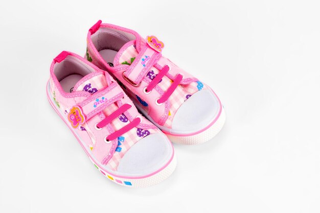 Children pink sneakers