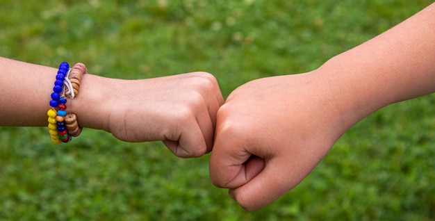 The children put their hands together Selective focus