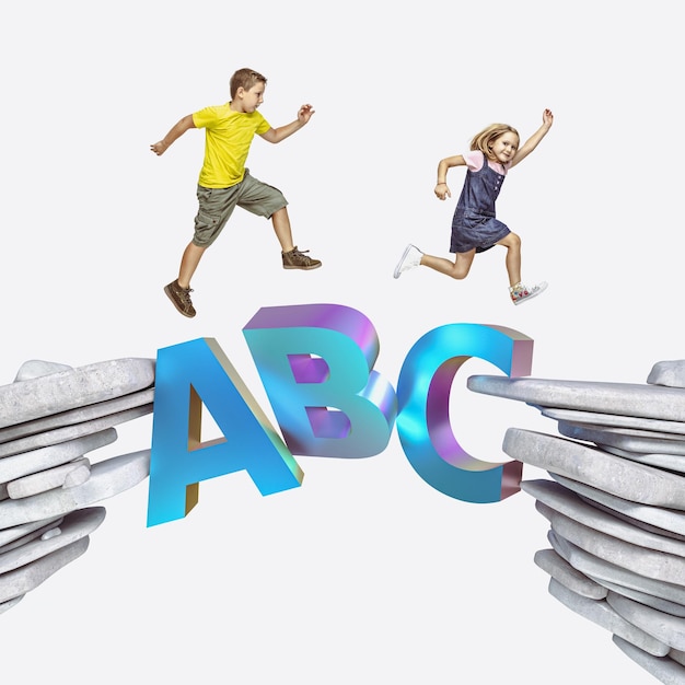 Children run across a bridge made with letters