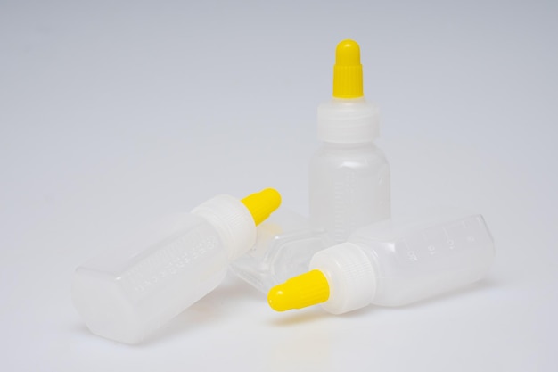 Children's medical potion bottles on a white background