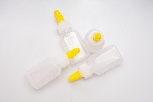 Children's medical potion bottles on a white background