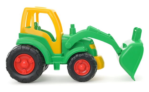 Children's plastic toy, yellow-green bulldozer isolated on white