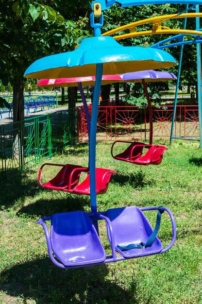 Children's swing in the amusement park