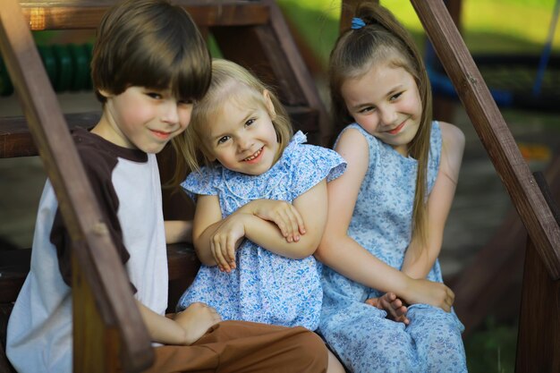 Children walk in the summer in nature Child on a sunny spring morning in the park Traveling with children