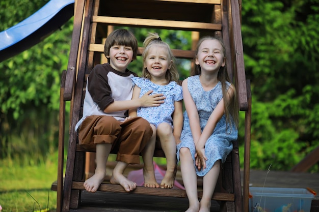 Children walk in the summer in nature Child on a sunny spring morning in the park Traveling with children