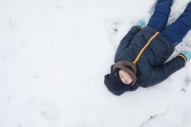 Children in winter park play