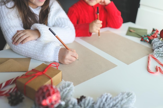 Children write a letter to Santa festive atmospheric photo