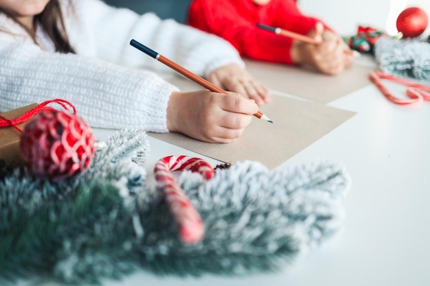 Children write a letter to Santa festive atmospheric photo