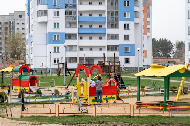 Childrens playground in a residential area childrens horizontal bars rock climbing slides